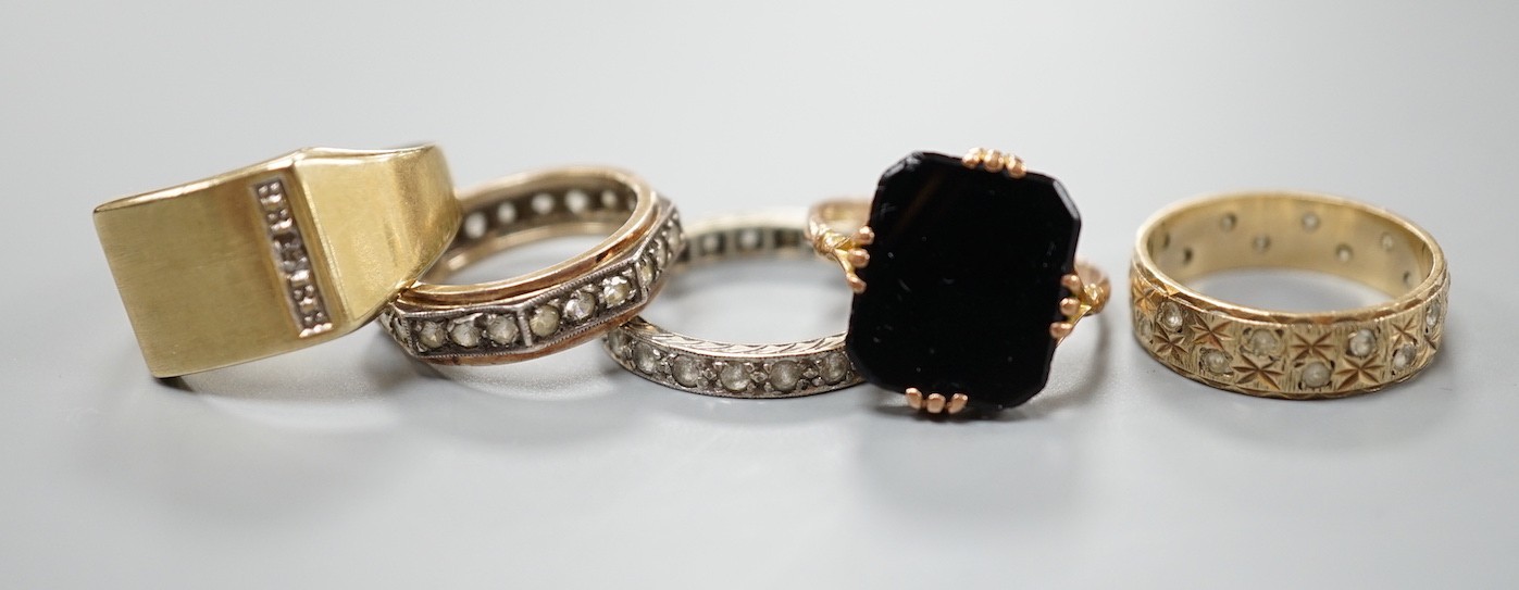 Five assorted mainly modern 9ct and gem set rings, gross weight 13 grams.